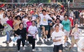 Students celebrate after they have concluded the college entrance exam in Changsha, central China's Hunan Province. Photo by Xinhua/Chen Sihan.