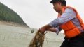 Rangers capture illegal fishing tools by the Poyang lake in east China's Jiangxi Province. Photo by Xinhua/Peng Zhaozhi.