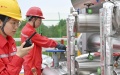 Technicians carry out equipment maintenance at a well of the Fuling shale gas field in Zhongxian County, southwest China's Chongqing. Photo by Xinhua/Wang Quanchao.