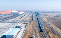 A China-Europe freight train running past the Qisumu international railway logistics hub in Ulanqab, north China's Inner Mongolia Autonomous Region. Photo by Xinhua/Lian Zhen.