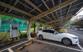 A parking lot equipped with photovoltaic power generation facilities and charging piles for new energy vehicles in the Boao near-zero carbon demonstration zone in Boao, south China's Hainan Province. Photo by Xinhua/Pu Xiaoxu.