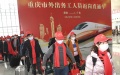 Migrant workers walk to the platform to get on the train D4881 at Chongqing West Railway Station in Chongqing, southwest China. Photo by Xinhua/Wang Quanchao.