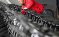 A worker arranges electric bicycles at a factory of Flying Pigeon in Tianjin, north China. Photo by Xinhua/Zhao Zishuo.