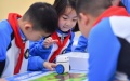 Students take part in a programming class at a primary school in Yuhu District of Xiangtan City, central China's Hunan Province. Photo by Xinhua/Chen Zeguo.
