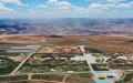 A view of a former coal mine after ecological restoration in Jungar Banner, north China's Inner Mongolia Autonomous Region. Photo by Xinhua/Liu Lei.