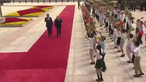 Putin arrives in China; Chinese children forced to jump in front of the russian dictator