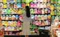 A consumer shops at a supermarket in Tengzhou, east China's Shandong Province. Photo by Sun Yang/Xinhua.