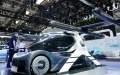 Visitors watch a land-and-air vehicle displayed at the 2024 Beijing International Automotive Exhibition in Beijing, China. Photo by Xinhua/Zhang Chenlin.