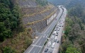 Vehicles running on an expressway in Longsheng County, south China's Guangxi Zhuang Autonomous Region. Photo by Pan Zhixiang/Xinhua.