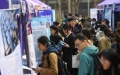 Students attend a job fair at Tsinghua University in Beijing, capital of China. Photo by Xinhua/Ju Huanzong.