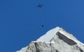 DJI drone flying over Khumbu Icefall during a delivery test on Mount Qomolangma from the Nepali side. Photo by Xinhua.