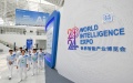 Volunteers walk into the venue of the World Intelligence Expo 2024 in north China's Tianjin. Photo by Xinhua/Sun Fanyue.