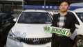 Beijing issues NEV license plates to households without car. Photo by Xinhua.