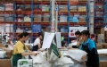 Workers work at a warehouse in Longli County, southwest China's Guizhou Province. Photo by Yuan Fuhong/Xinhua.