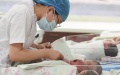 China has bolstered its birth-defect prevention system. Photo by Xinhua.