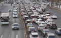 Traffic on the roads of the PRC. Photo by Xinhua.