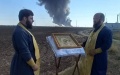 In russia, they call priests of russian Orthodox Church to put out large-scale fire at oil depot in Rostov
