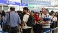 Foreign passengers enter the border check section of Beijing Capital International Airport in Beijing, capital of China. Photo by Xinhua/Li Xin.