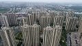 China pushes for reform in real estate sales system. Photo by Xinhua.