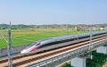 A Huaihua-Hengyang train operates on its route near Hengyang City, Hunan Province. Photo by Xinhua.