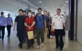 Five economic crime suspects escorted back to China from Cambodia. Photo by Xinhua.