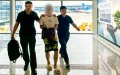 Suspected trafficker extradited from Cambodia to China. Photo by Xinhua.