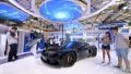 Visitors look at a new-energy sports car displayed at the World Intelligence Expo 2024 in north China's Tianjin. Photo by Xinhua/Zhao Zishuo.