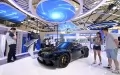 Visitors look at a new-energy sports car displayed at the World Intelligence Expo 2024 in north China's Tianjin. Photo by Xinhua/Zhao Zishuo.