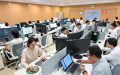 Researchers work at the research and development center of Sigma Geography, a geographic sciences multi-modal Large Language Model (LLM). Photo by Xinhua/Li Xin.