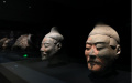 Color-painted figureheads are pictured during an exhibition commemorating the 50th anniversary of the discovery and excavation of the iconic Terracotta Warriors. Photo by Xinhua/Li Yibo.
