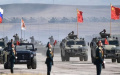 Chinese and russian soldiers at a parade. Illustrative photo: Anadolu Agency