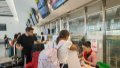 Foreign tourists go through procedures at Chengdu Tianfu International Airport in Chengdu, southwest China's Sichuan Province. Photo by Xinhua/Dong Xiaohong.