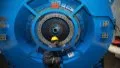 A worker assembling the floating offshore wind turbine in Yancheng, east China's Jiangsu Province.  Photo by Xinhua.