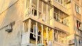 Broken windows and burnt cars. Consequences of missile strike shown in Kremenchuk