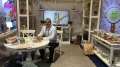 Dmytro Antonenko next to his inventions at the ABC Kids EXPO, Las Vegas, 2013