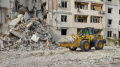 Attack on residential building in Kherson. Rescuers suspend clearing of rubble due to threat of shelling