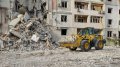 Attack on residential building in Kherson. Rescuers suspend clearing of rubble due to threat of shelling