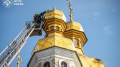 Cross from dome of Church of All Saints in Kyiv-Pechersk Lavra collapses