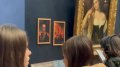 Pranksters hang portraits of Trump and Merz in Louvre next to Titian painting