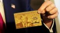 Trump shows off "gold card" with his portrait: for USD 5 million it gives right to reside in US