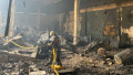 Russians hit Nova Poshta building in Izium, some parcels burned in fire