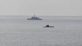 Russian submarine capable of launching Kalibr missiles surfaced off coast of France