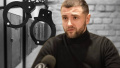 Behind Mindich folders is Artem Shylo - Zhelezniak