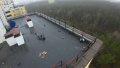 A robot on the roof of a house. Screenshot of the SESU video