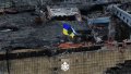 The flag of Ukraine on the building of the Kupiansk city council. Photo: screenshot of the video.