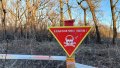 A car hit a mine in Kherson. Photo: SESU.