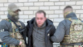 A detained Ukrzaliznytsia employee. Photo: SSU