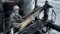 Rescuers are extinguishing a fire at an oil facility. Photo: SESU