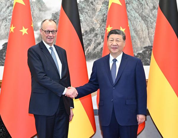 Friedrich Merz and Xi Jinping. Photo: Chinese Foreign Ministry