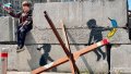 Banksy's work on Maidan Nezalezhnosti in Kyiv. Photo: Denys Gorokhovskyi/Ukrainian News